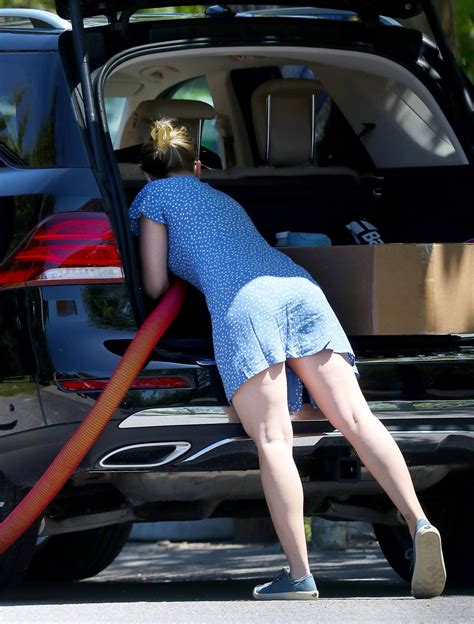 Scarlett Johansson In Blue Mini Dress Cleaning Her Suv