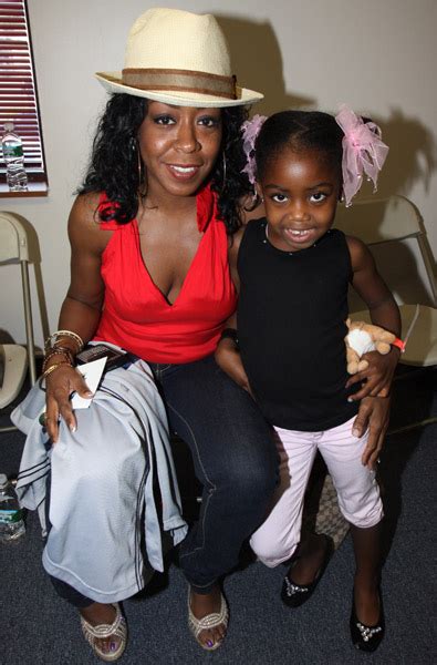 tichina arnold and alijah smile for the camera