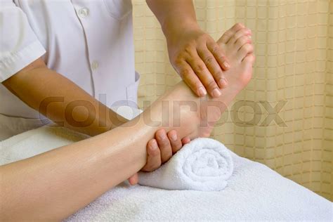 reflexology foot massage spa foot massage treatment stock image