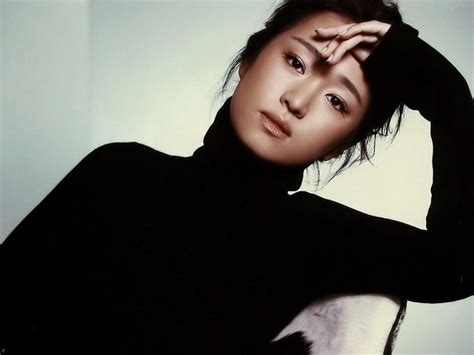 stunning chinese gong li stylish sex icon she has twice been awarded the golden rooster