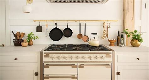 aga elise dual fuel range  ivory cream kitchen copper accents natural bright open