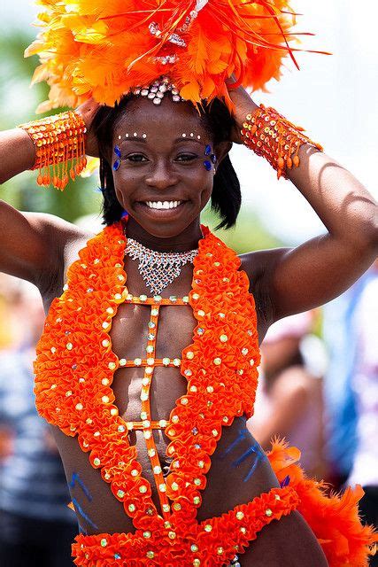 a sint maarten woman during carnival in english people pronounce the name of this country