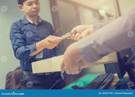 delivery man receive paying cash payment package courier parcel people hand giving courier