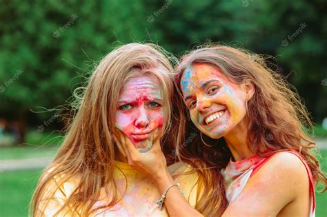 Premium Photo Two Women Girlfriends Having Fun At Holi Fest Portrait