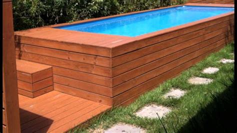 ground pool design idea  recycled steel dumpster