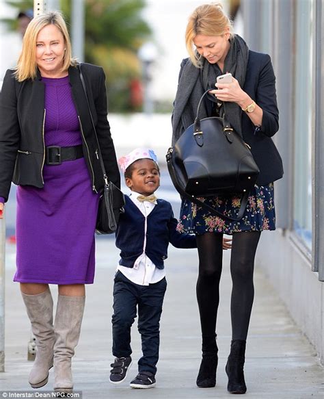 charlize theron s son dons a paper crown with mum and grandma daily mail online