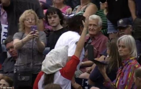 donald trump rally ends in violence as female protester wears kkk hood and nazi salutes daily