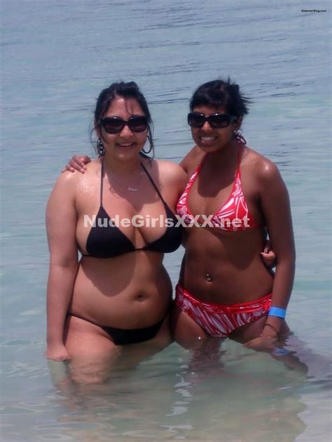 Horny Indian Girls Posing In Bikinis Showing Sexy Cleavage