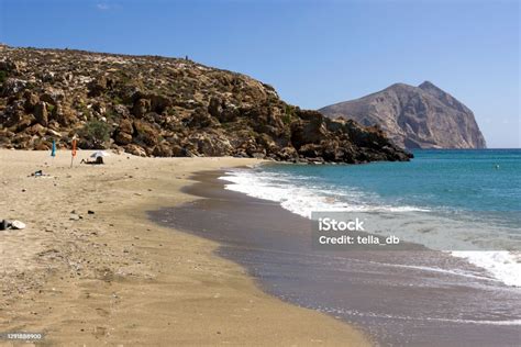 anafi island  long beautiful beach  roukonas   thick sand   kalamos rock