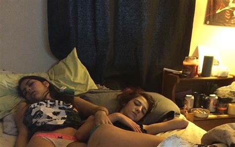 drunk college girls passed out in bed after a night of hard partying