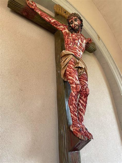 friday  crucifix showing  jesus    looked   scourging