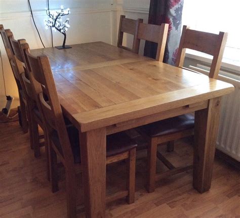 solid oak extending dining table  leatheroak chairs  dumbarton