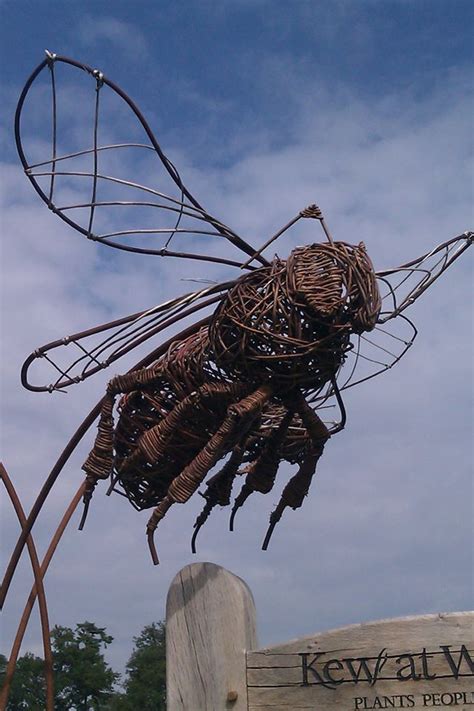 nice bee sculpture in iron and willow wakehurst place england bee art