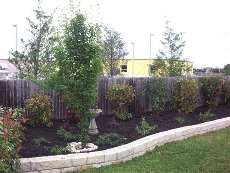 landscape planters border wall installation backyard landscaping