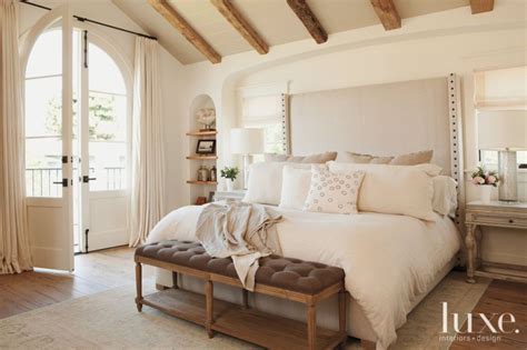 White Traditional Master Bedroom With Upholstered Headboard Luxe