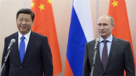 china s president xi jinping cozies up to russia in sochi tv interview