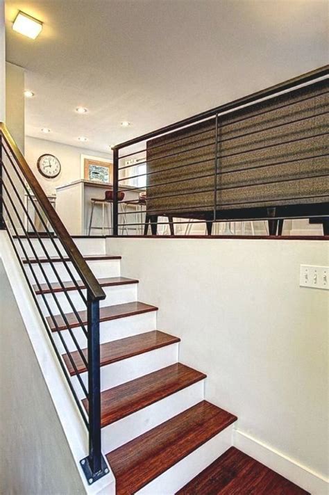 split level living room railing   staircase design inspiration check   photo