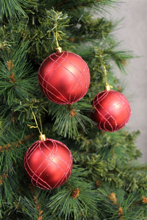 red bauble set  unreal christmas trees