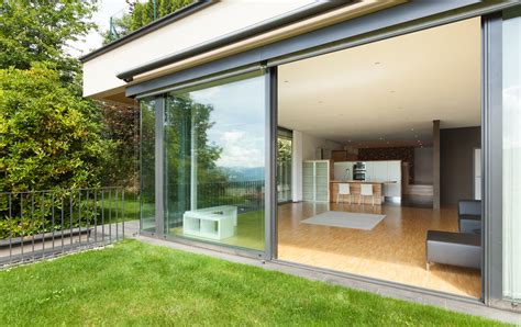create indoor outdoor living space with glass doors or walls