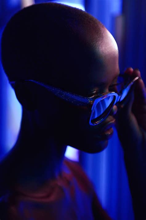 pop portraits with neon light reflected in sunglasses
