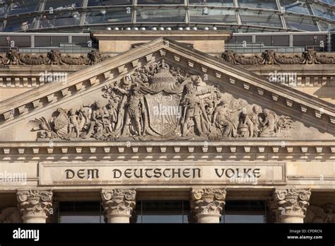 dem deutschen volke inscription   pediment   reichstag berlin germany stock photo