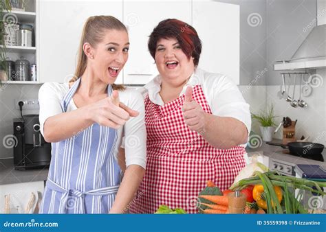 Fat And Overweight Woman Posing In The Kitchen Girl Friends Wi Stock