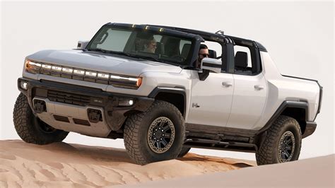 gmc hummer ev pickup  weigh  pounds report  drive