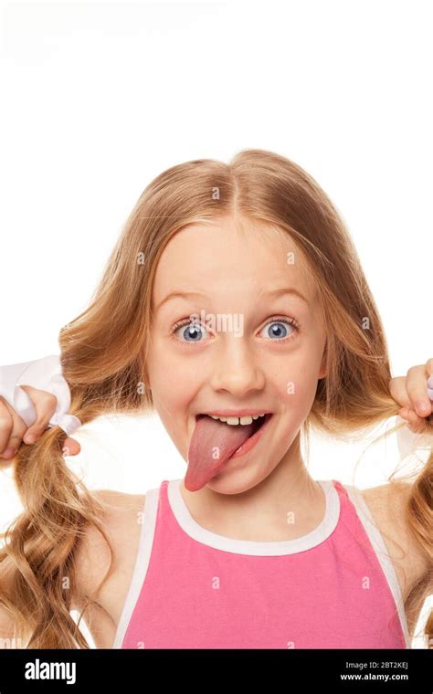 cute girl makes funny faces and smiles photo with a white background