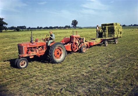 baling hay   farmall  tractor photograph wisconsin historical