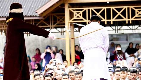 indonesian men face 80 strokes of the cane for gay sex