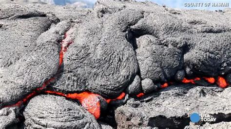 Oozing Lava Flows Near A Cemetery In Hawaii