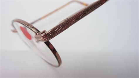 stabile brille brillengestell ovale metallfassung mit kunststoffbuegeln