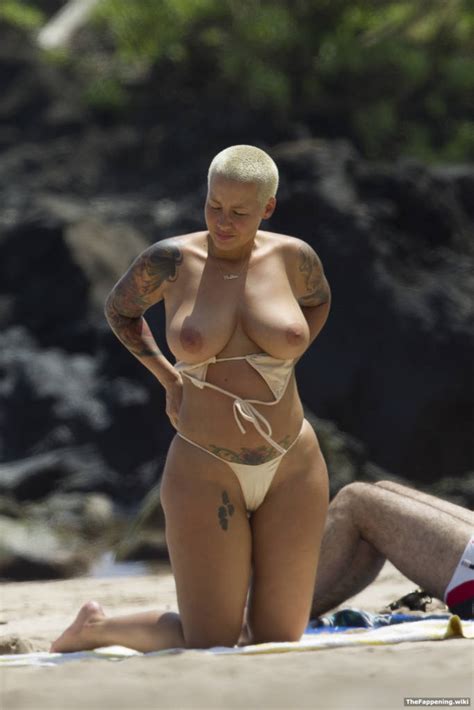 hot amber rose topless on the beach uncensored