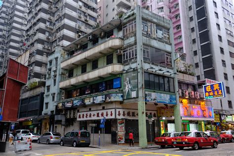 disappearing buildings  hong kong iii   corner tenement building  wan chai