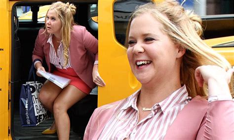 amy schumer shows off toned legs in pink mini skirt daily mail online