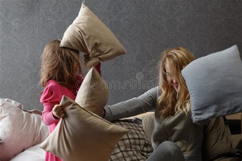 Daughter Reads The Book On The Bed While Mom Sleeps Stock Image Image