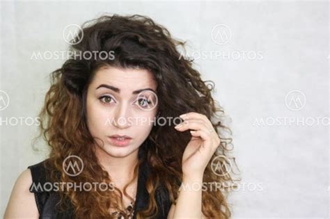 beautiful girl curly haire by kseniia glazkova mostphotos