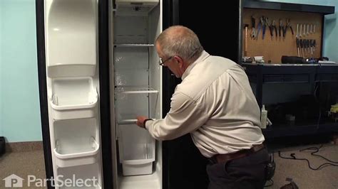 refrigerator repair replacing  defrost thermostat frigidaire part