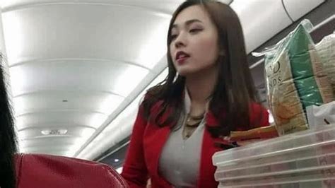 world s most beautiful air hostess viral photo divides the internet 9travel