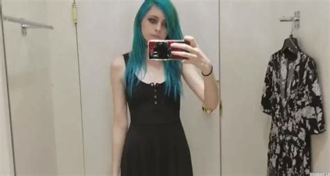 skinny gothic girl taking a selfie at hudson bay dressing
