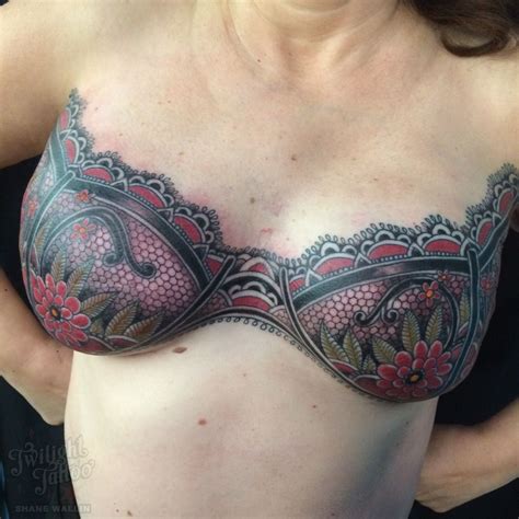 extreme breast tattoos