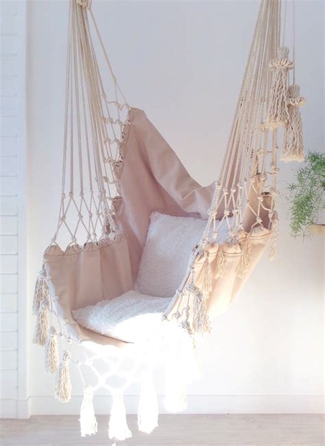 hammock hanging   ceiling   room  white walls  wood