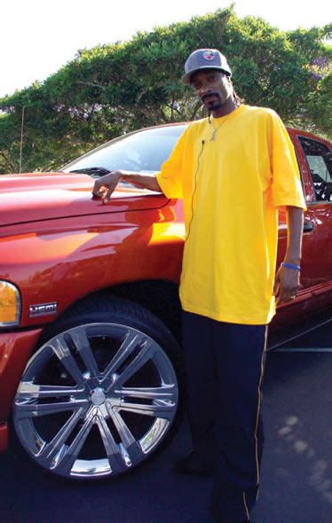 juicy j 30 photos of rappers flexing with giant car rims complex