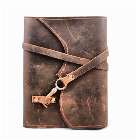distressed brown leather book cover leather  divinadenuevo