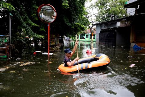 Dozens Dead In Landslides As Flash Floods Hit Indonesian