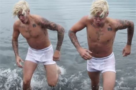 justin bieber hasn t got much to show as he braves the chill in tight boxers for icy swim