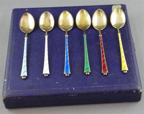 six danish enamelled silver demitasse spoons gilded by