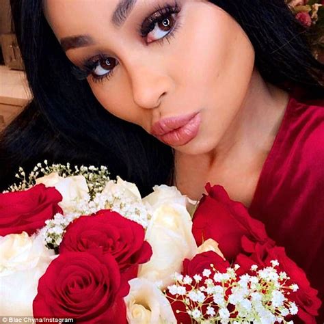 blac chyna dresses up in sexy crimson dress on instagram daily mail online