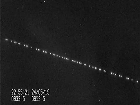spacexs starlink satellite train   night sky space