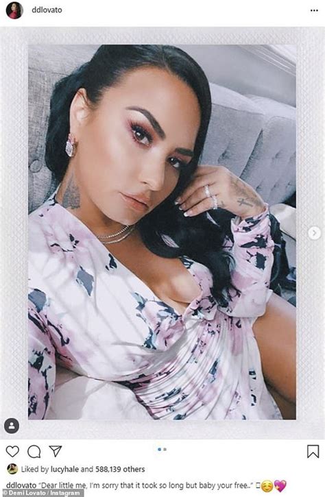 demi lovato showcases her curves in a white and pink wrap